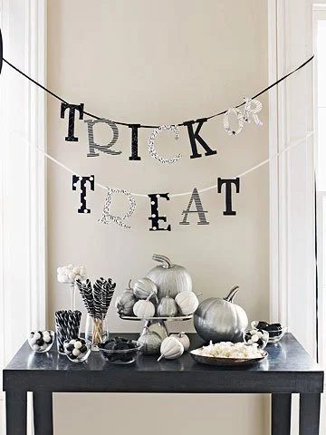 silver and black pumpkins via Family Circle