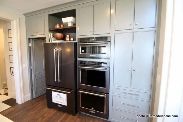 Modern Farmhouse Gray Kitchen Cabinetry With Open Shelves Above Fridge, UVPH 2018 Home 16 Arive Homes