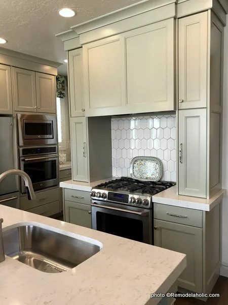 Light Gray Kitchen Cabinets With White Tile Backsplash White Countertop, UVPH17 House 24 Ivory Homes