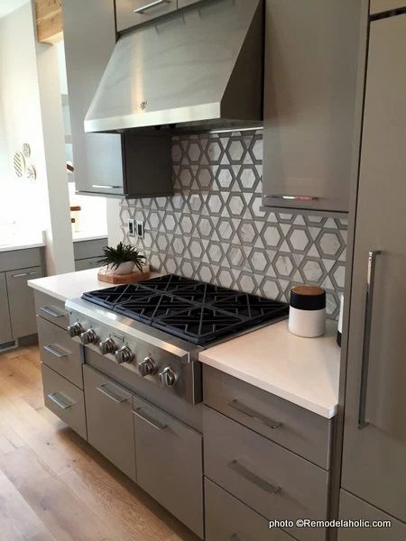Modern Gray Kitchen Cabinets, Large Handles, Gray Pattern Tile Backsplash, UVPH 2016 Home 35 Emerald Homes