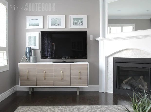 IKEA method console, with corner fireplace Handmade makeover, marble tile, oversize mirror over mantel Pink Little Notebook featured on @Bekob