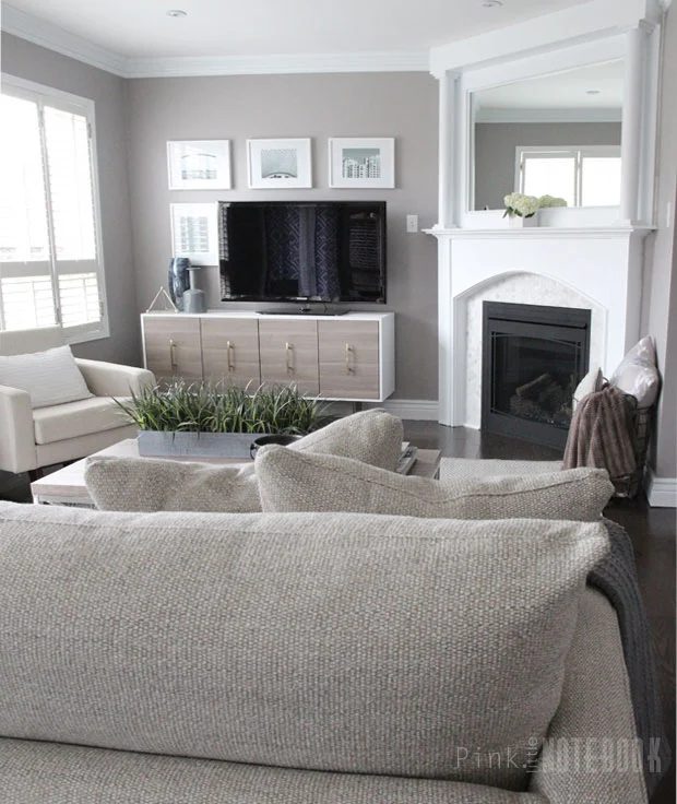 vivid neutral living room with a Handmade fireplace makeover (and an straightforward way to Handmade pillars!)