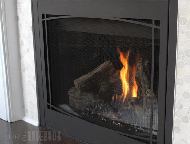 Marble hex tile in Handmade fireplace surround makeover Pink Little Notebook featured on @Bekob