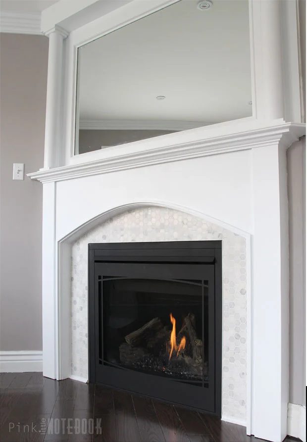 How to update a dated tile fireplace and mirrored mantel -- such a great Handmade job for a fresh look! Pink Little Notebook on Bekob.com