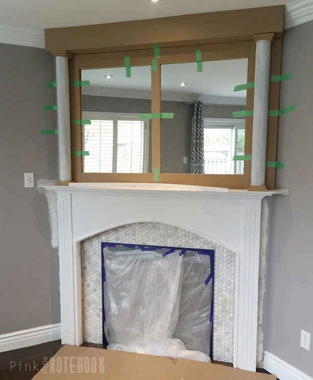 Handmade mantel pillars for fireplace makeover Pink Little Notebook featured on @Bekob