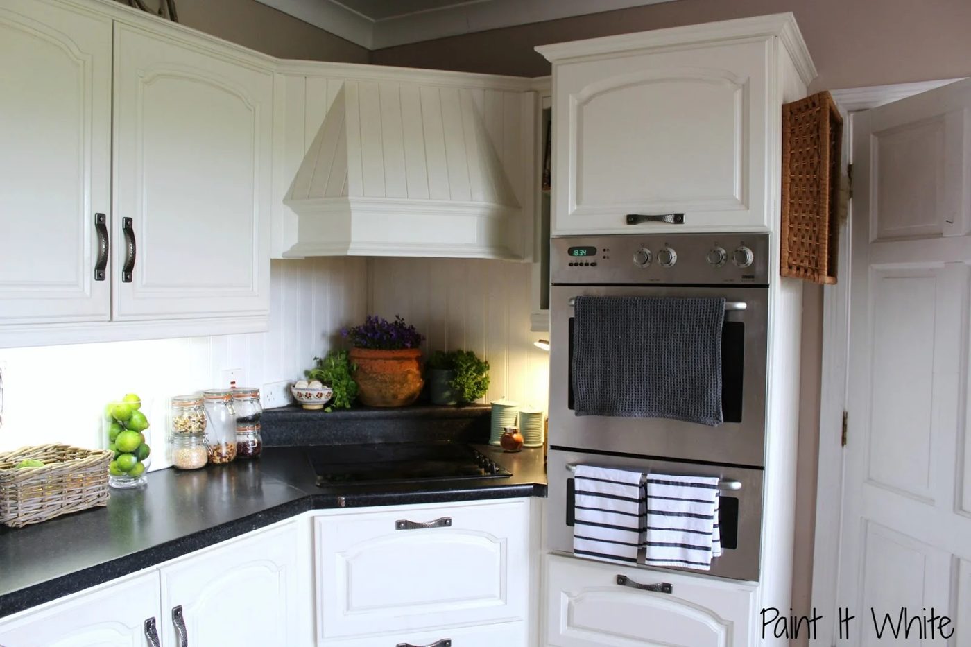 Annie Sloan chalk paint in Old White wood kitchen cabinet update, Rustic accents for white kitchen, by Paint it White featured on @Bekob