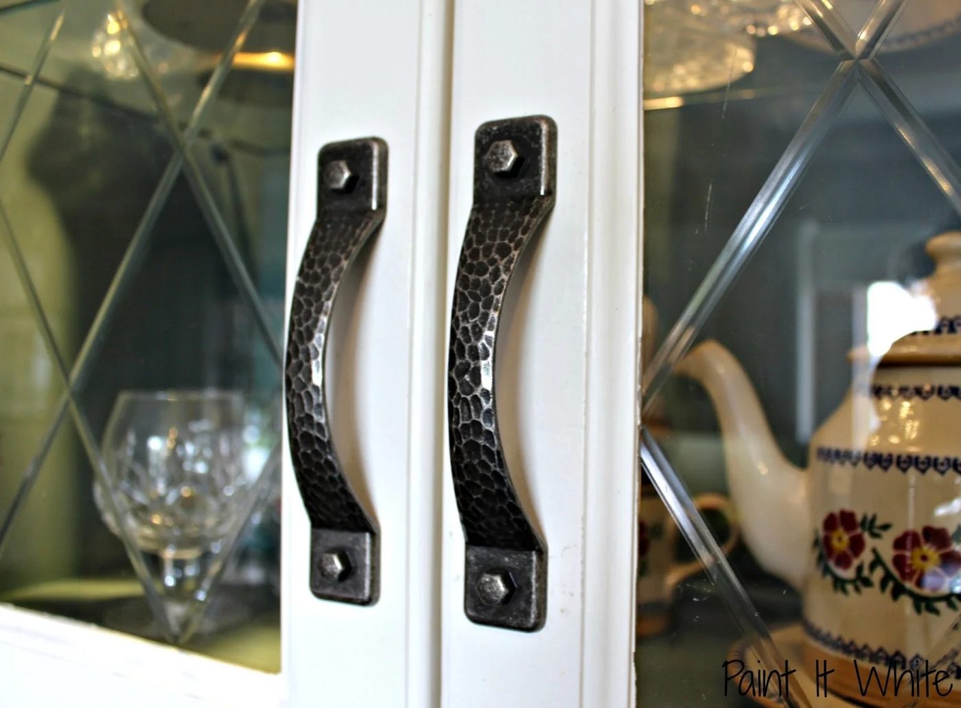 15 hammered pewter hardware on chalk painted kitchen cabinets by Paint it White featured on @Bekob