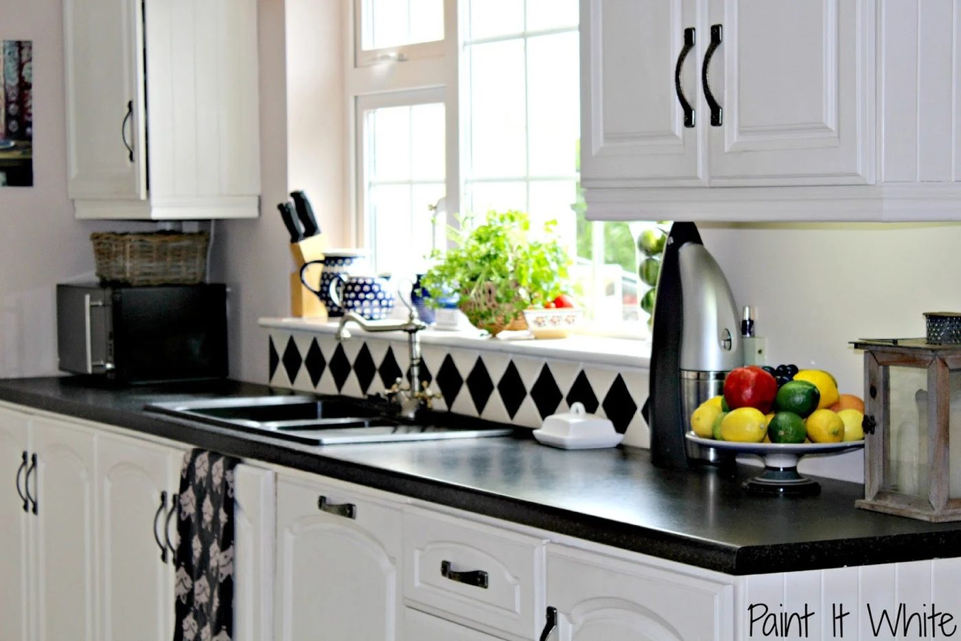 1 Chalk painted cabinets in rustic white kitchen, Paint it White featured on @Bekob
