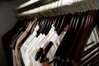 Master Bedroom Closet Before and After Using Baskets