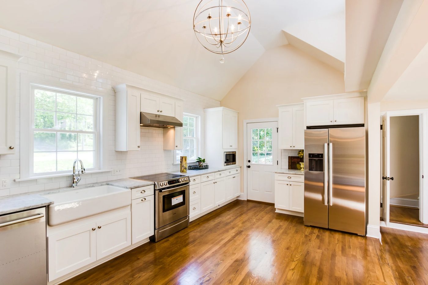 7 renovated kitchen with wood floors and white subway tile, Cobblestone DG on Bekob