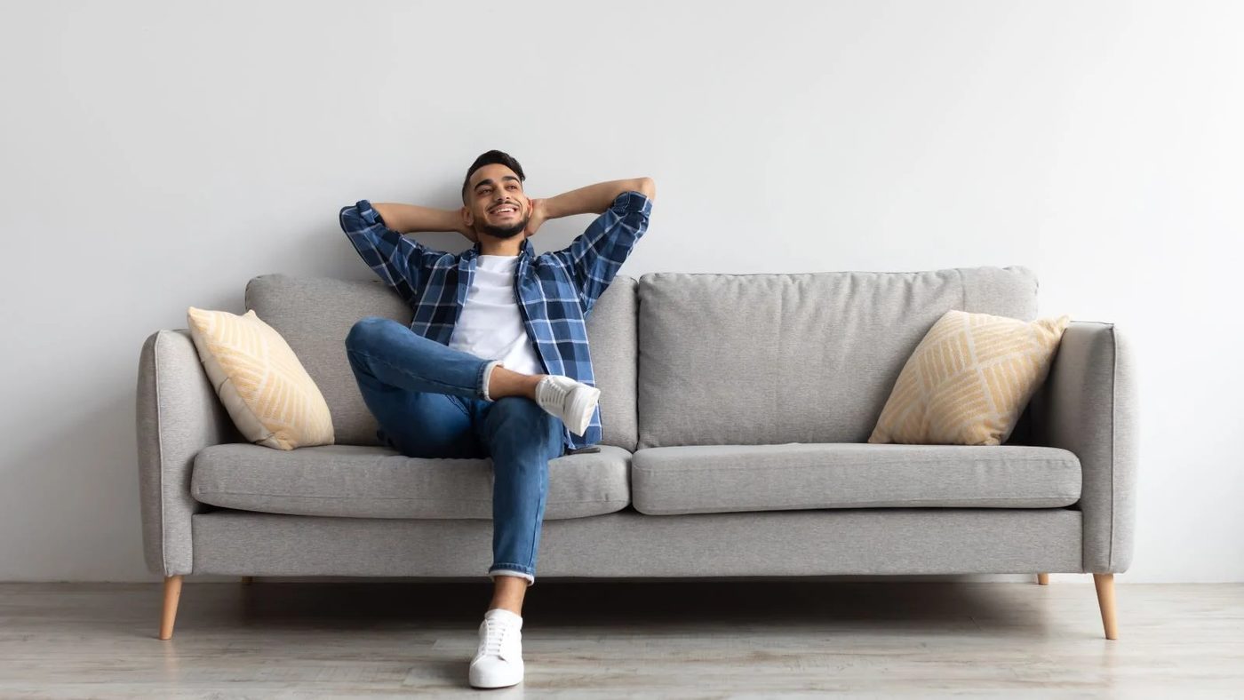 Man Relaxing Sofa