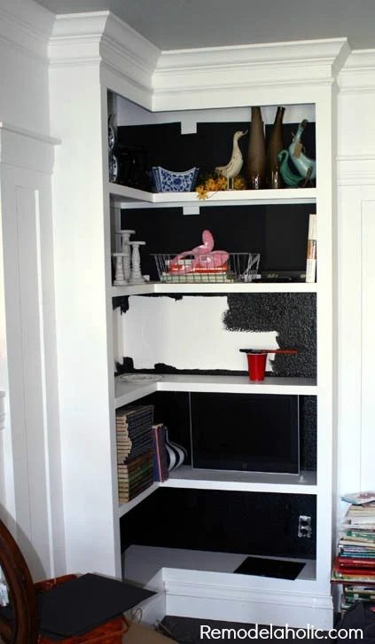 paint bookcase backings black to add depth and drama @Bekob