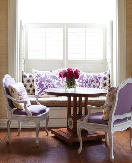 Canadian House & Home dining with purple upholstery