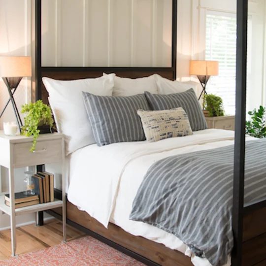 Fixer Upper Graham House Master Bedroom, Wood Bed With White Bedding And Grey Accents