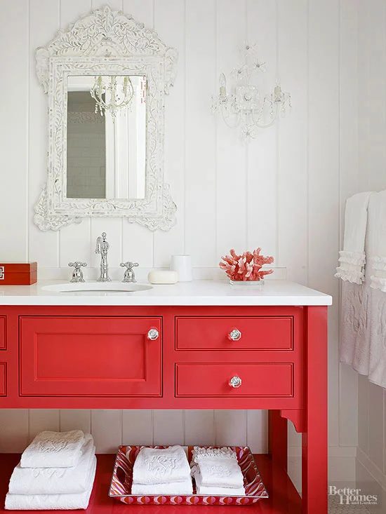 Bold Colorful Bathroom Inspiration | Bright Red Vanity with Ornate Mirror and Sconce