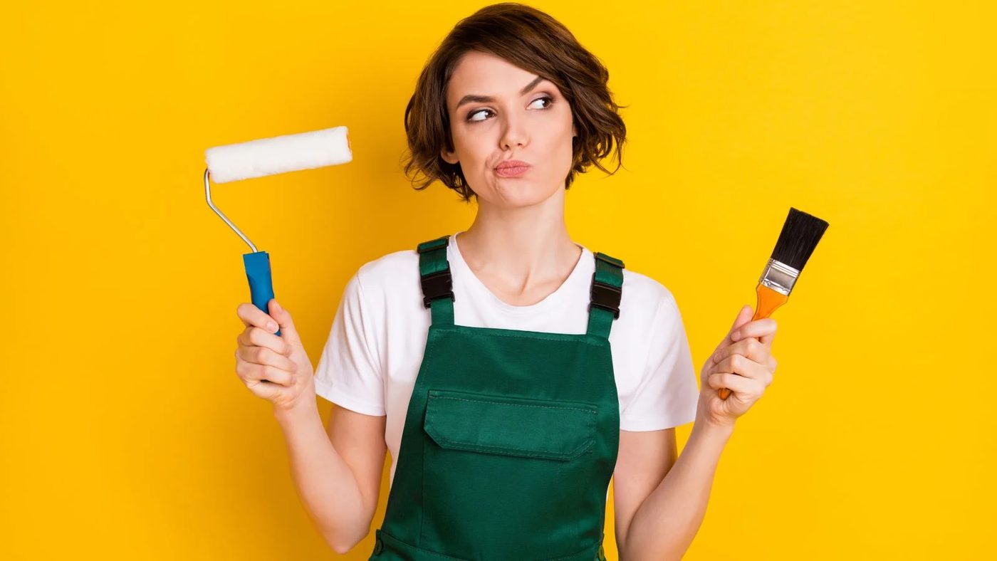 Woman Holding Paint Brush