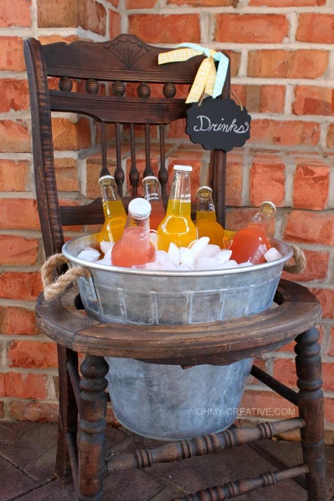 vintage chair turned drink stand with a galvanized bucket, Oh My Creative