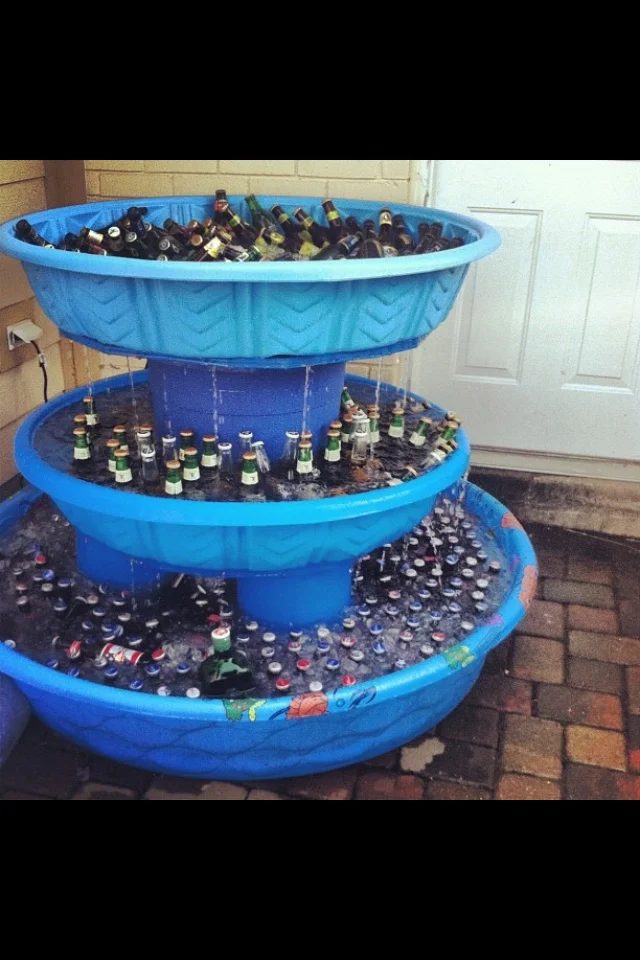 stacked kiddie pools for a drink cooler at a party via @Bekob