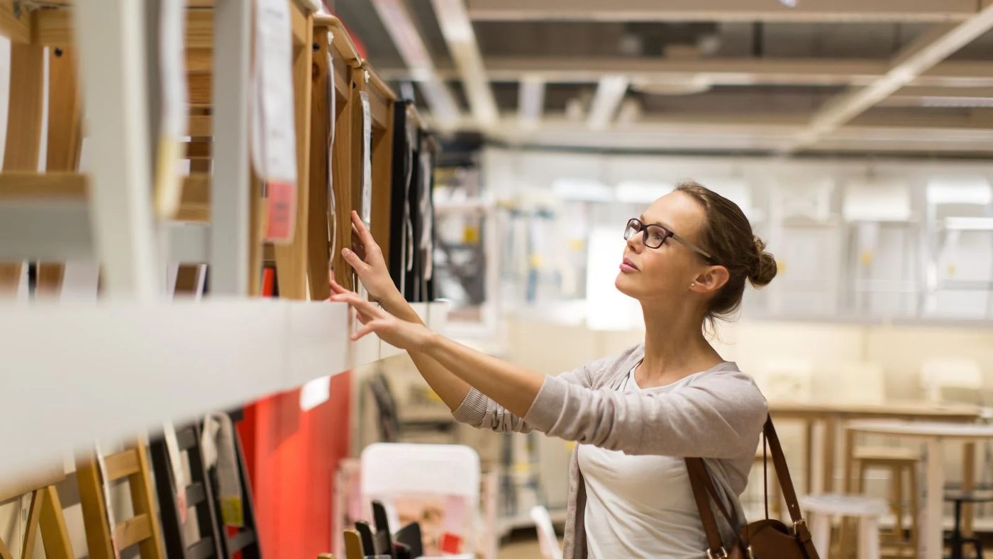 Woman Looking At Furniture