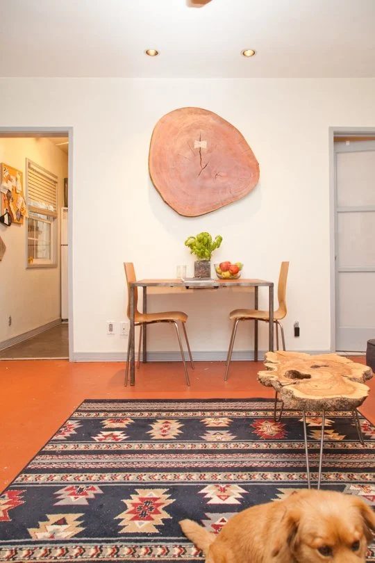 Handmade Wall Decor options: large wood slice wall art - that becomes an accent table! (via Apartment Therapy)