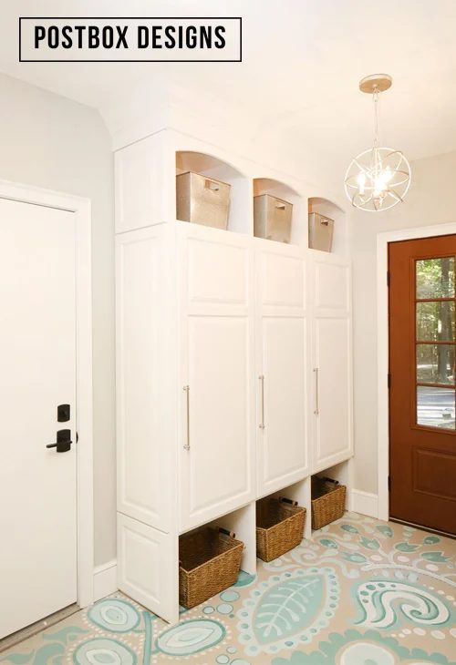 memorable Handmade mudroom entry with lockers and floor to ceiling storage and a striking painted floor