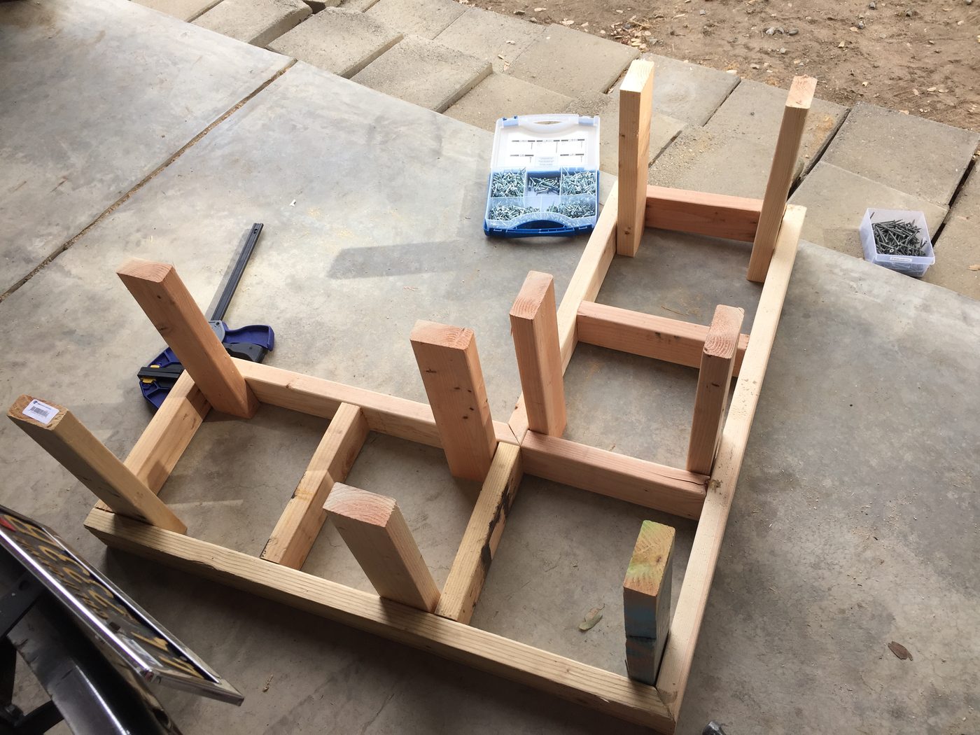 Attach legs to inside of frame using 2 1/2 wood screws and wood glue