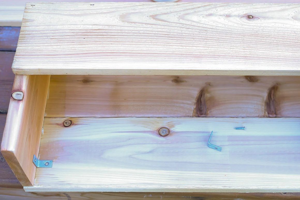 Step 7, add interior brackets for cedar wood window box support