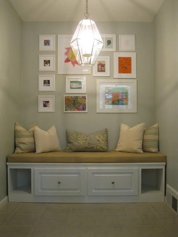 built-in banquette bench with storage and pillows, featured on Bekob