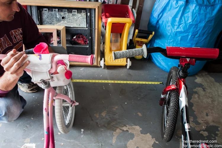 straightforward Handmade bike rack walkthrough to organize your garage NOW! Bekob.com via heatherednest.com