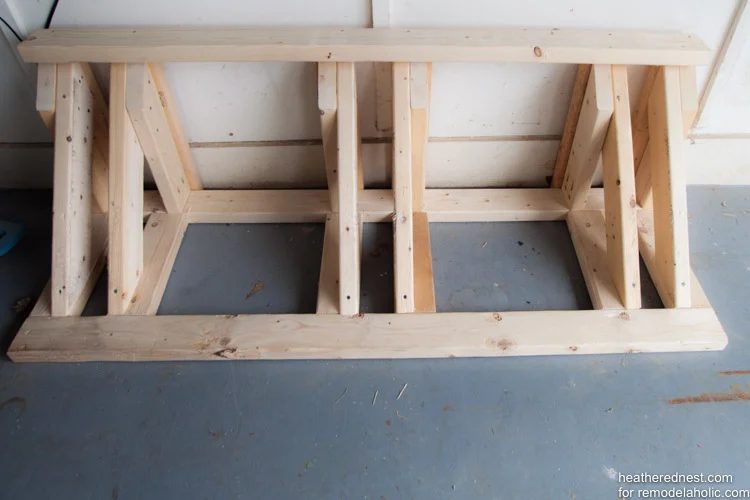 straightforward Handmade bike rack walkthrough to organize your garage NOW! Bekob.com via heatherednest.com
