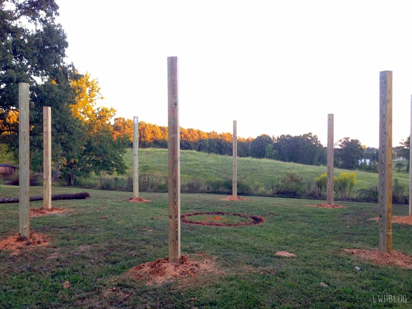 Step by Step Instructions for Building a Pergola and Fire Pit by Little White House Blog featured on @Bekob