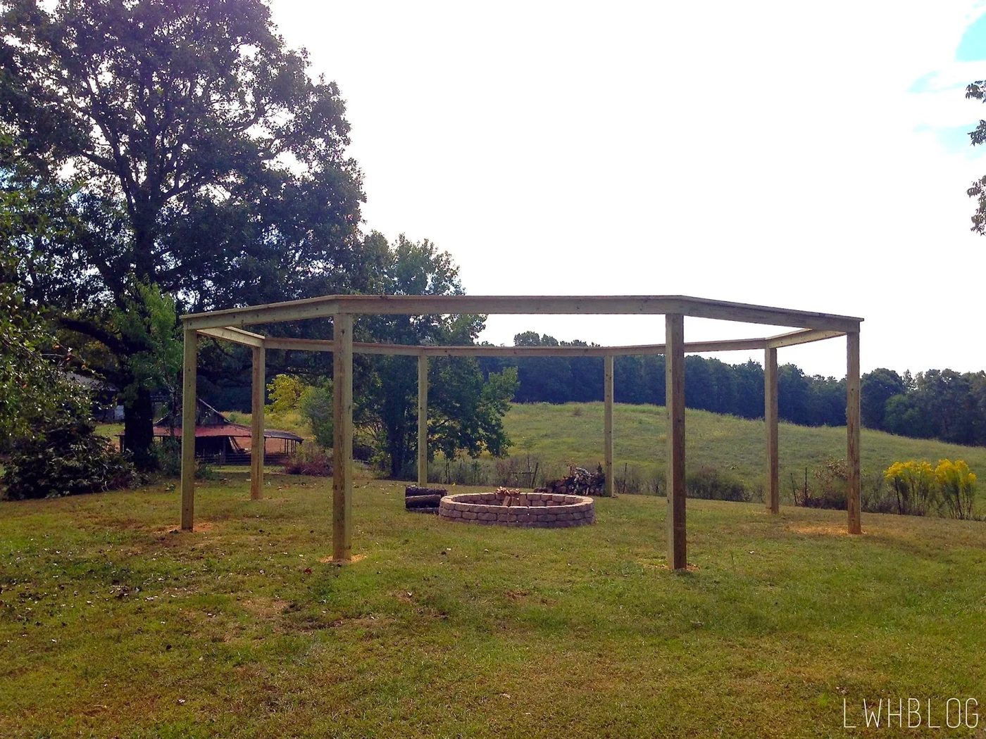 Creating a Pergola and Fire Pit by Little White House Blog featured on @Bekob