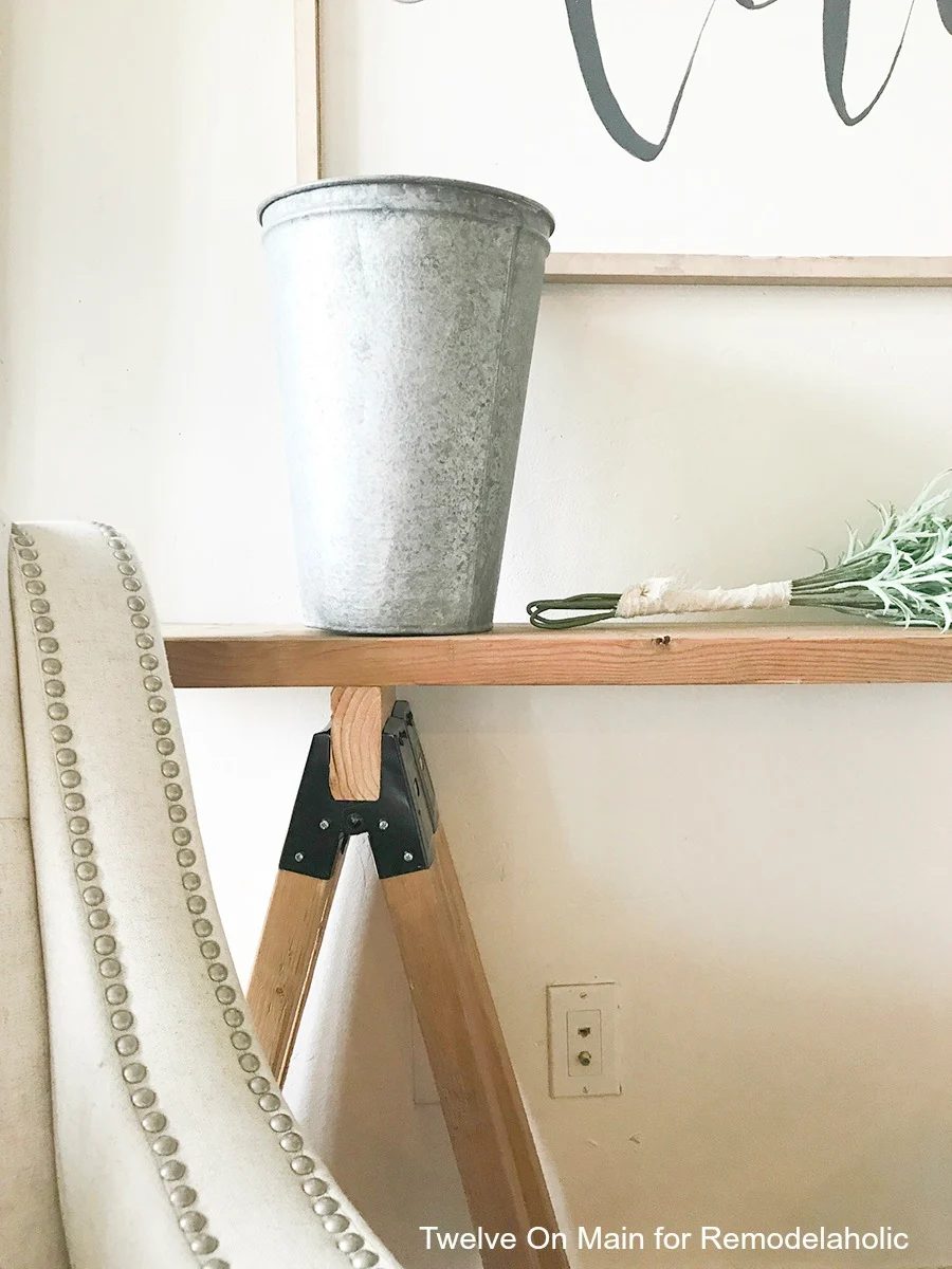 I love this Handmade sawhorse sofa table by Twelve On Main