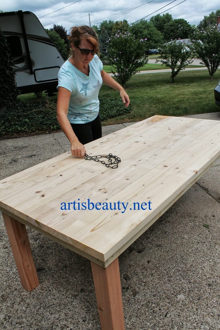 use a chain to give the farmhouse table character, featured on Bekob.com