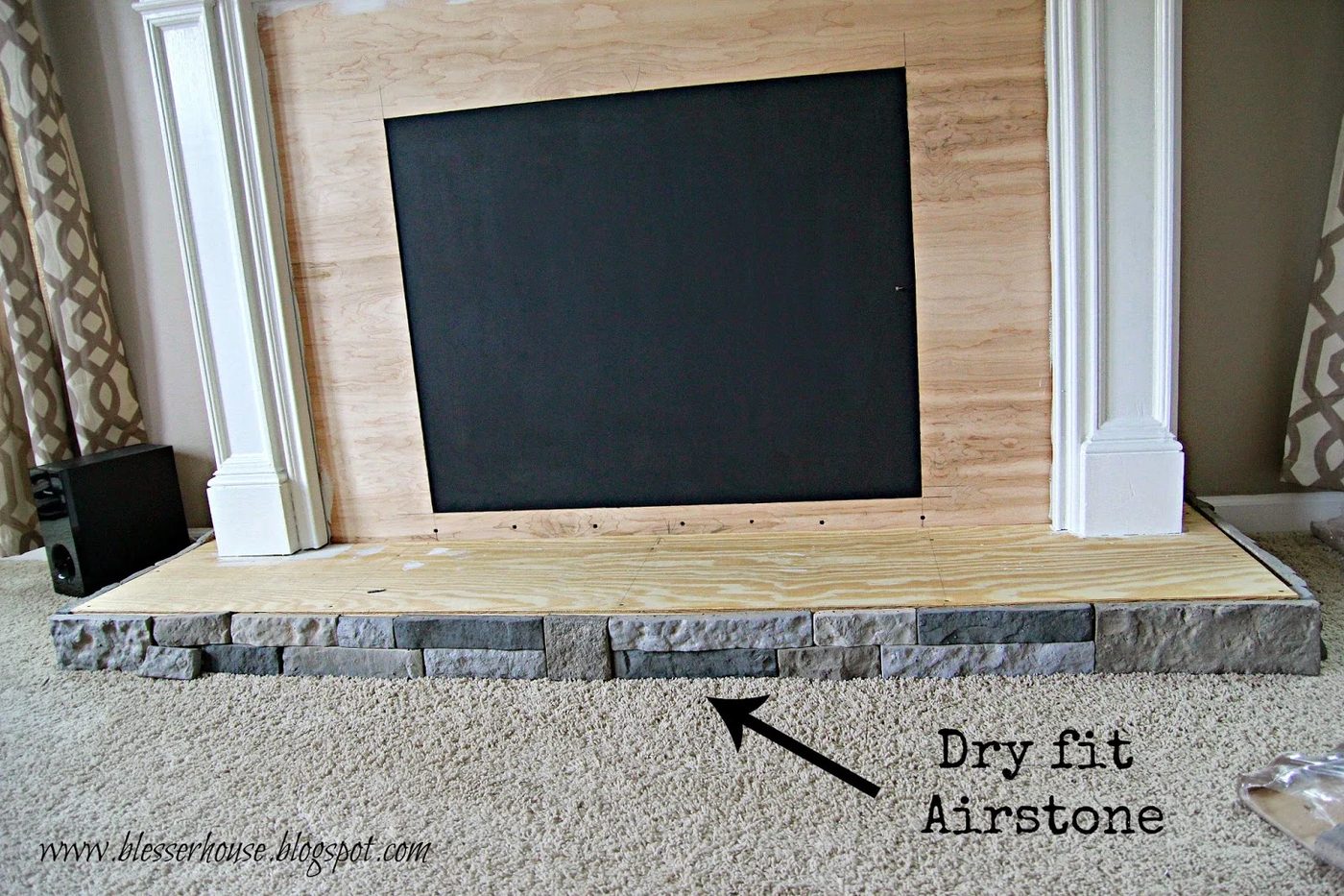 airstone on faux fireplace - Blesser House featured on @Bekob