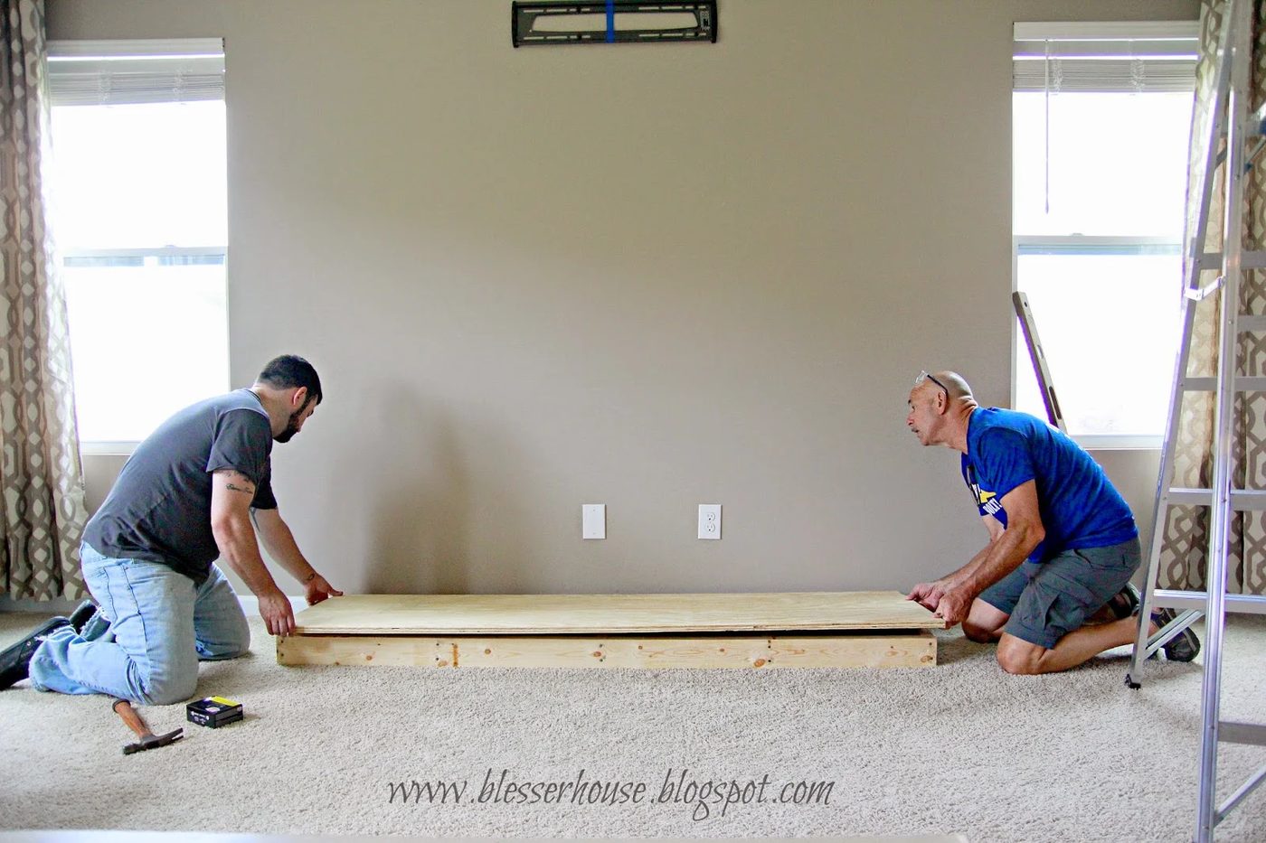 building the hearth base for handmade faux fireplace - Blesser House featured on @Bekob