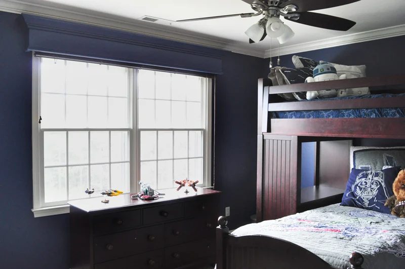 handmade wood window cornice for a boys room window treatment to cover window blind hardware