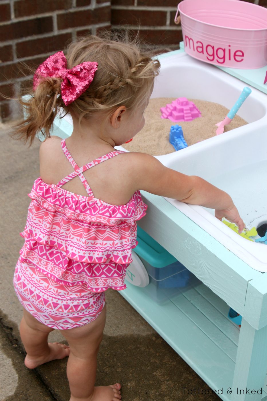 Handmade sand and water table using an old kitchen sink by Tattered and Inked featured on @Bekob