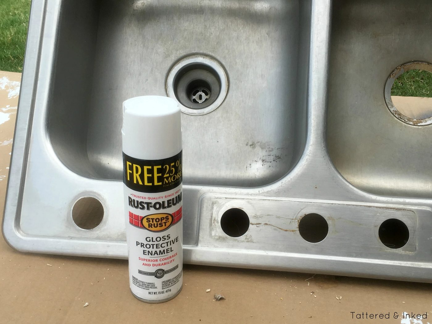 Spray paint an old sink to Handmade kids sand and water table by Tattered and Inked featured on @Bekob