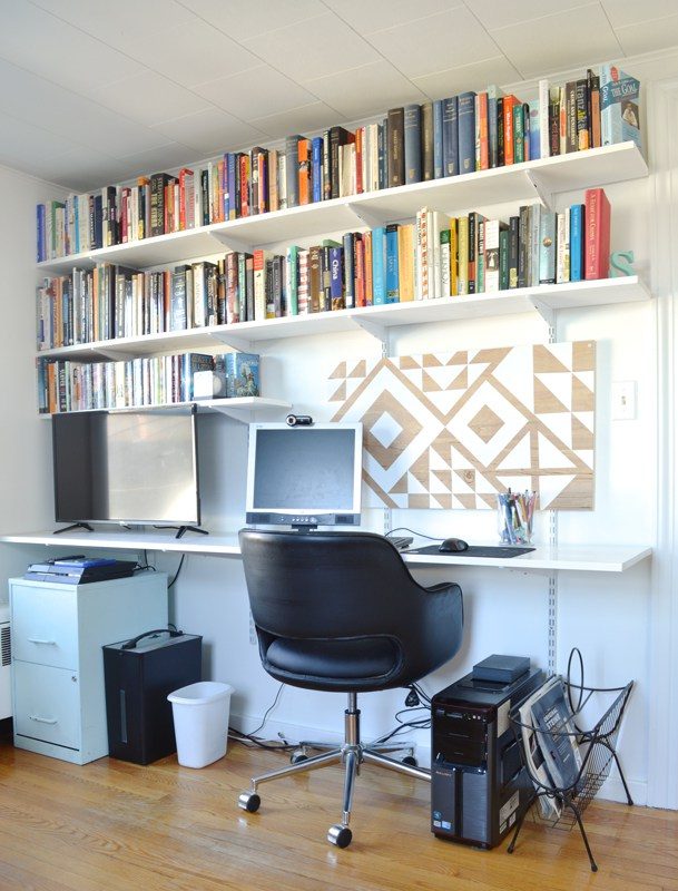 Handmade floating desk and shelves with handmade geometric art Plaster and Disaster