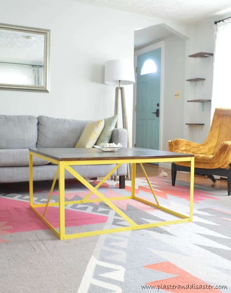 Make your own CUSTOM modern wood and metal coffee table with this great walkthrough from Plaster and Disaster on Bekob.com. How to build a metal table base AND make it structurall