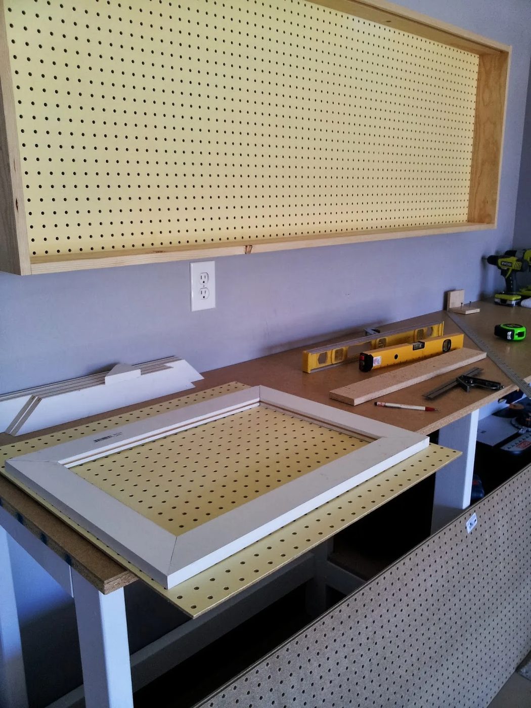 building sliding doors for the pegboard tool cabinet, featured on Bekob.com