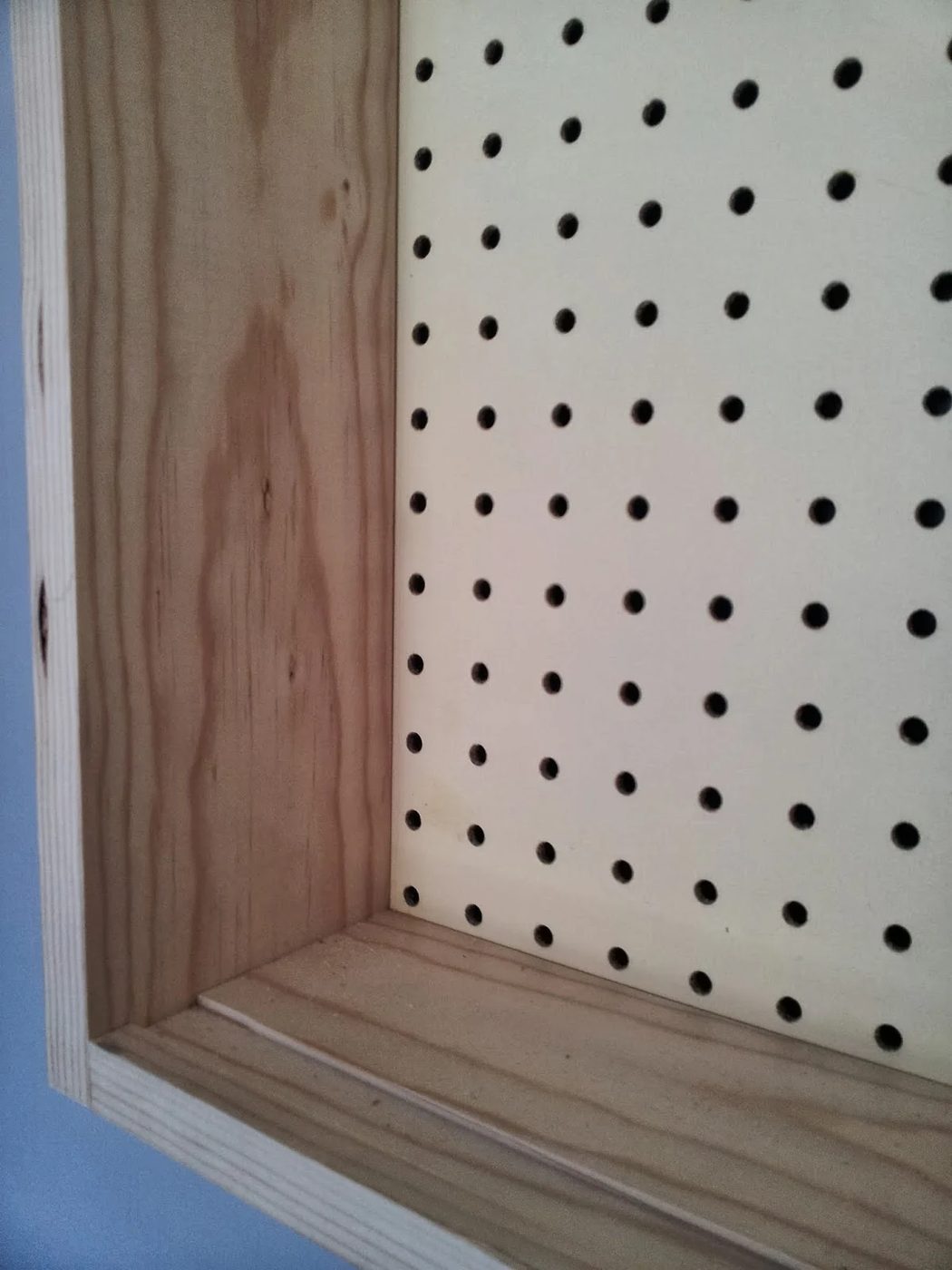 groove in pine board to allow tool cabinet doors to slide smoothly, featured on Bekob.com