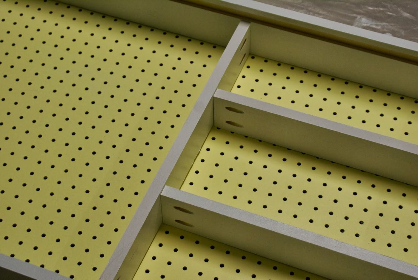 adding shelves to the pegboard tool cabinet, featured on Bekob.com
