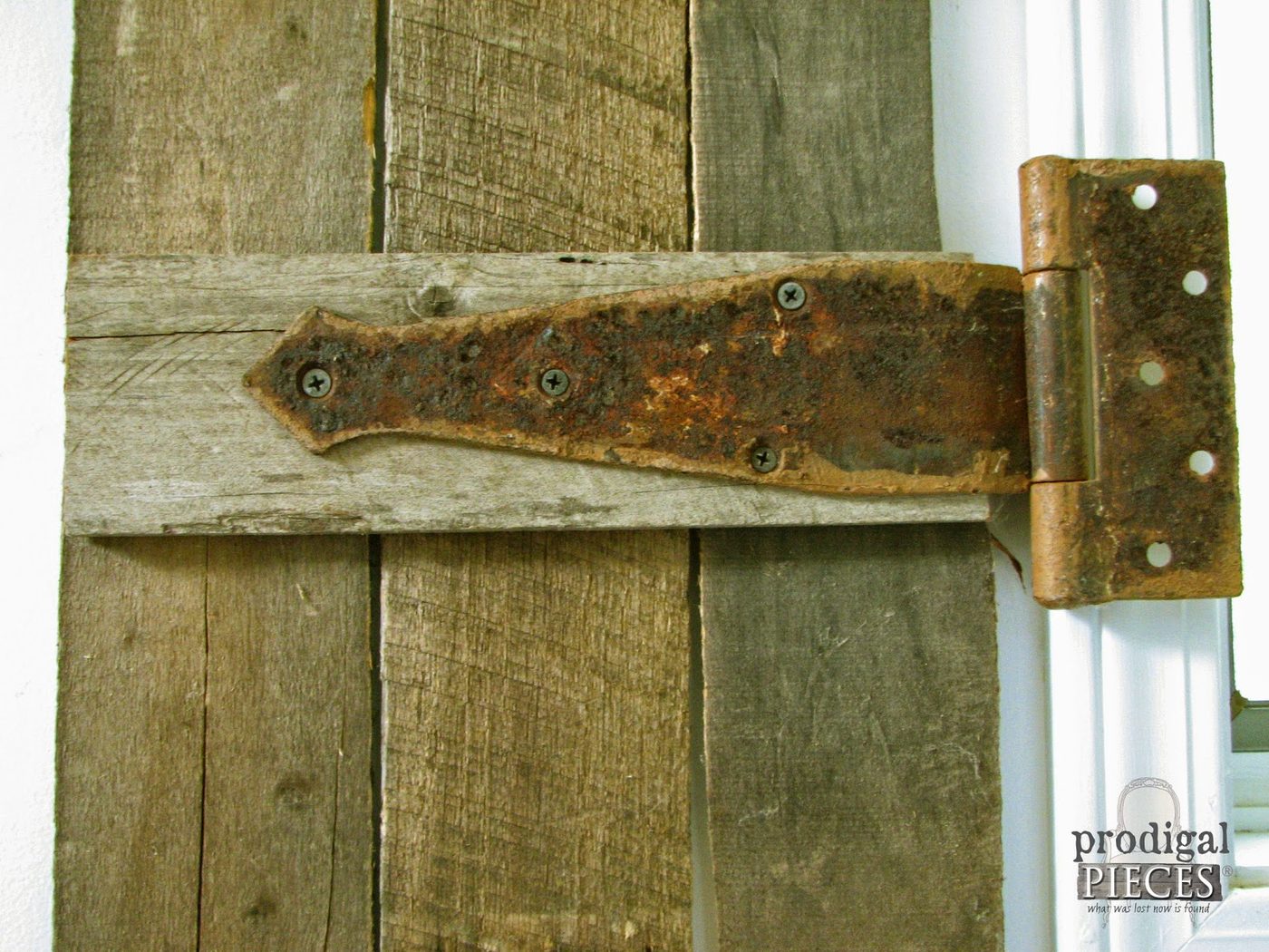 weathered rusty hinge on interior barnwood shutter made from pallets, Prodigal Pieces on Bekob