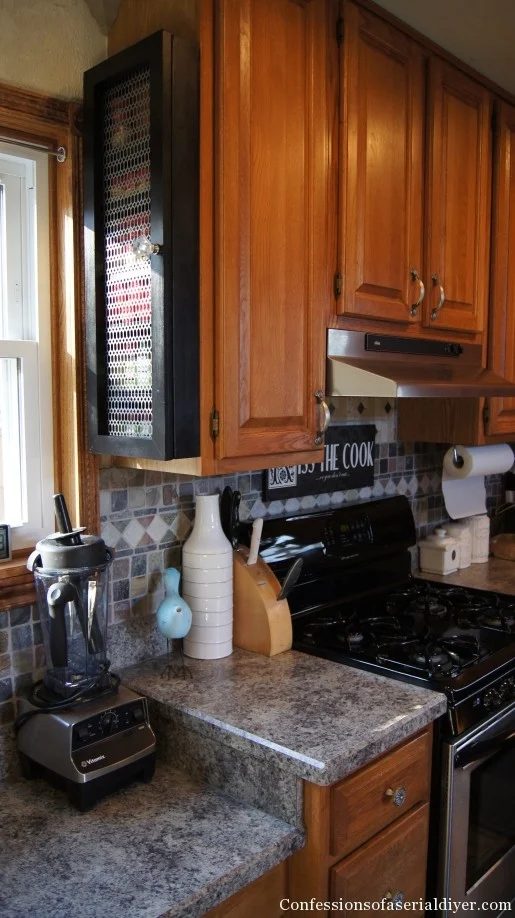 Save space with a Handmade spice cabinet on the side of the kitchen cabinet | Confessions of a Serial DIYer on Bekob.com