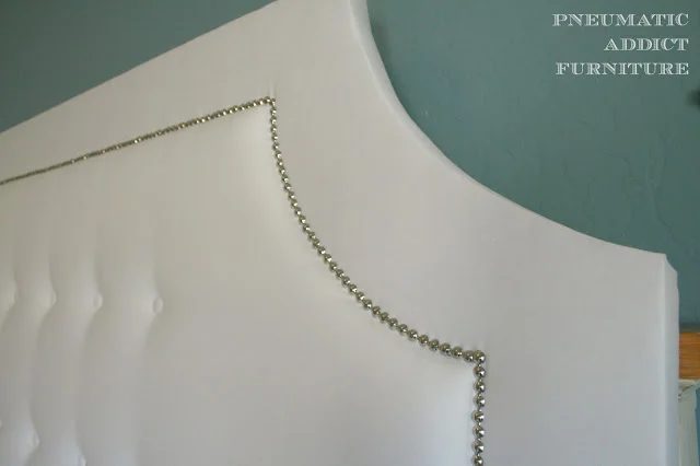 build a white tufted headboard with decorative nailhead trim
