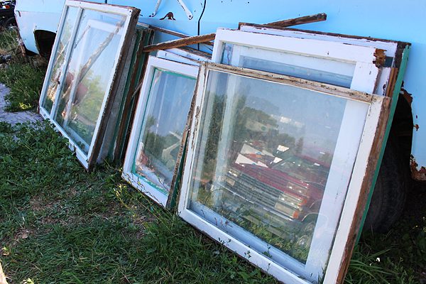 Upcycle Old Windows into Doors for a Storage Unit by Two Feet First featured on @Bekob
