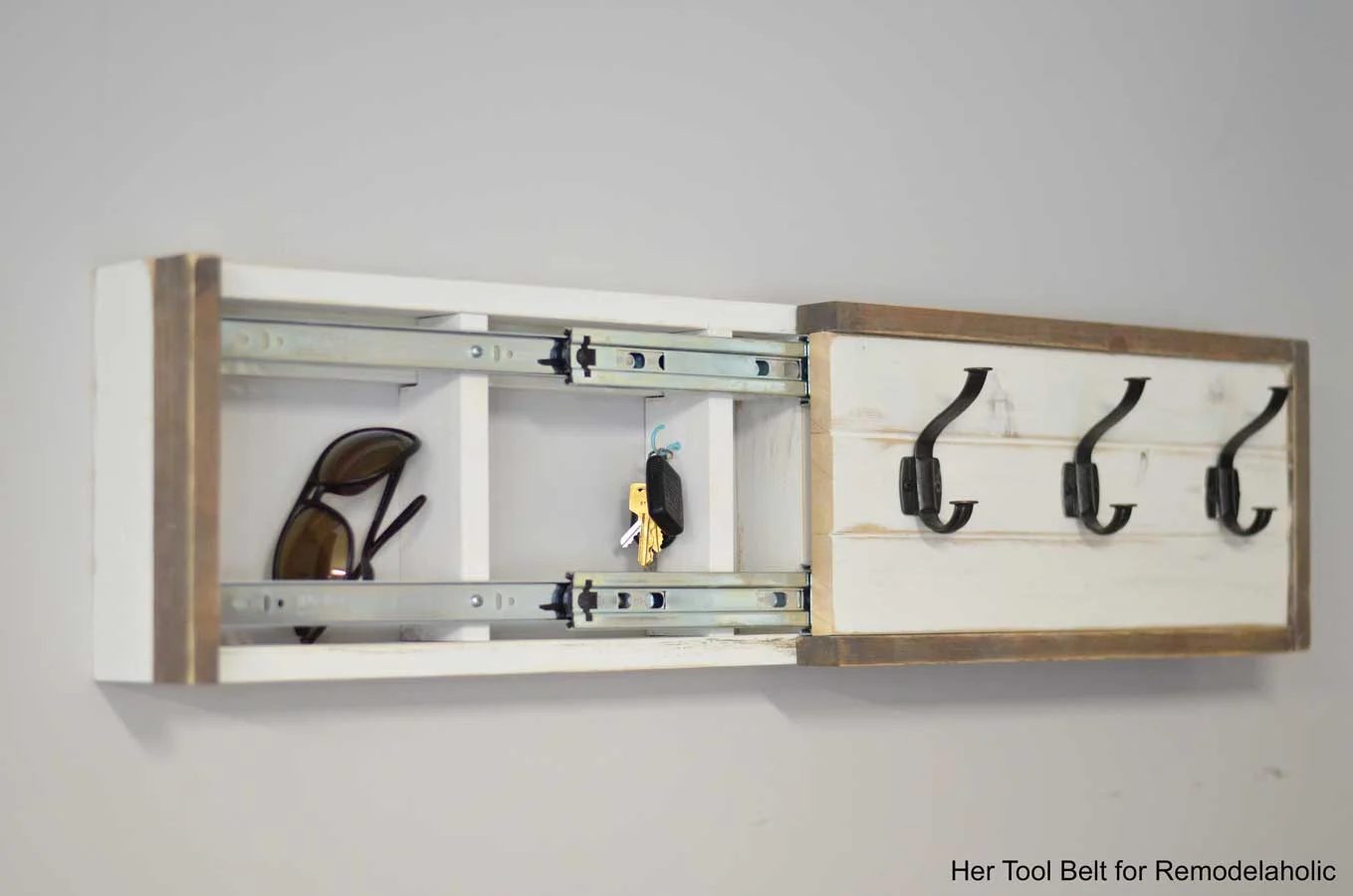 Build a farmhouse style coat rack with a secret compartment to hide small items.