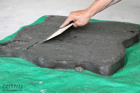 how to make your own rocks from concrete for a Handmade waterfall feature